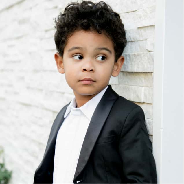 Boy in Tux Against Wall - Him Category