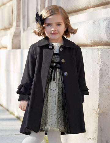 Adorable Little Girl Wearing Abel & Lula Black Coat Outside