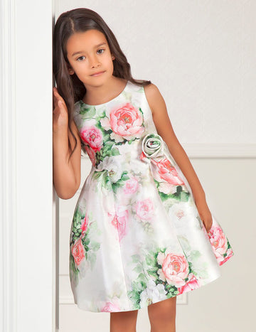 Little Girl in Floral Dress Leaning on the Wall