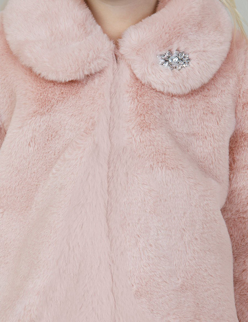 Close up  of the Little Girl Pink Fur Coat Showing the Collar Jewel Ornament