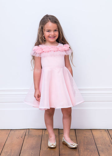 Little girl wearing David Charles Sugar Pink Tiered Dress.