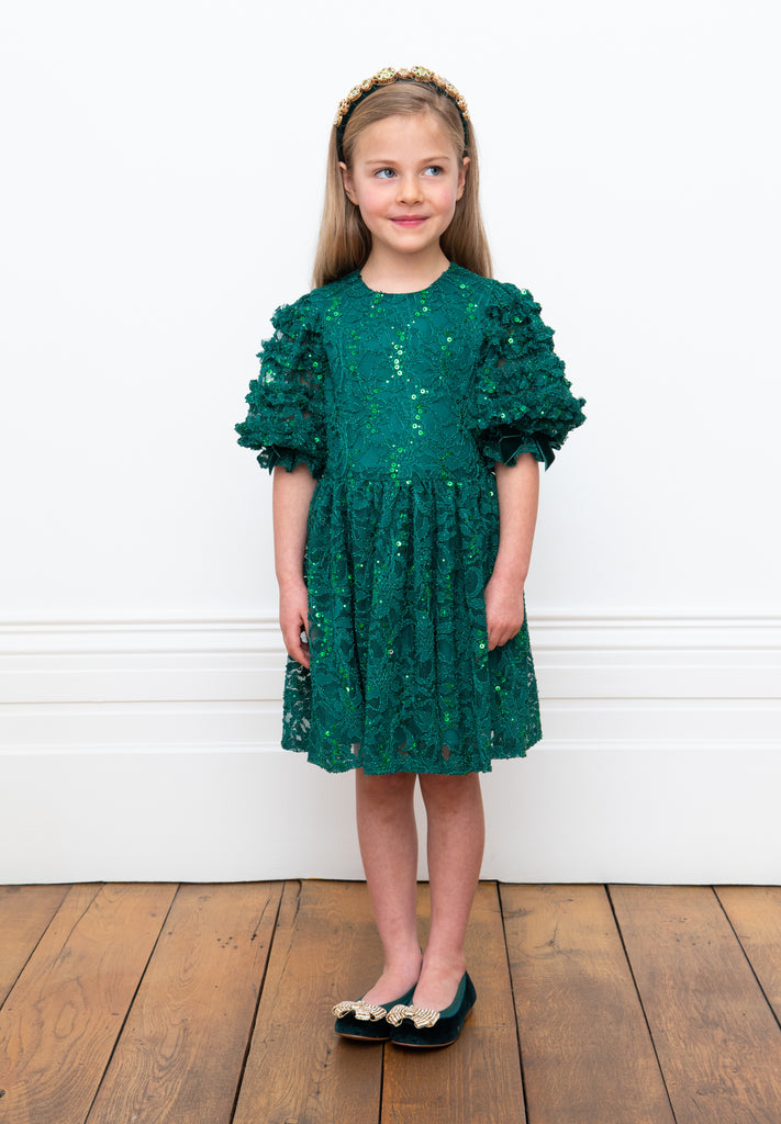 Little Girl Wearing David Charles Green Lace Dress.