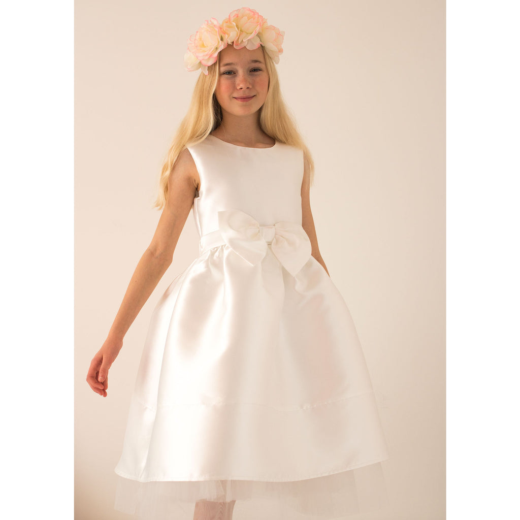 Girl wearing Holly Hastie Florence Ivory Taffeta Bow Dress.