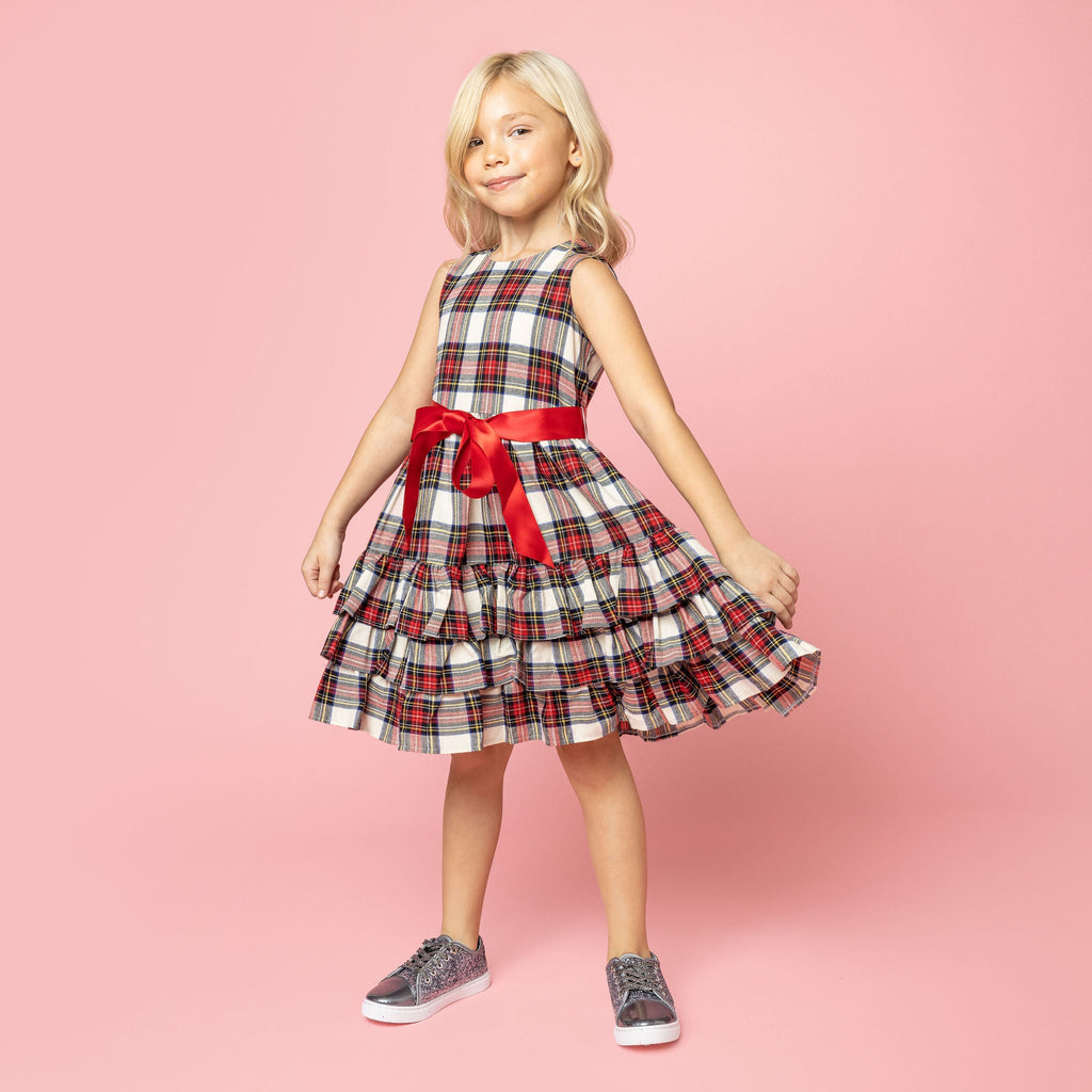 Girl Wearing Arabella Frill Plaid Tartan Girls Party Dress Pink Background