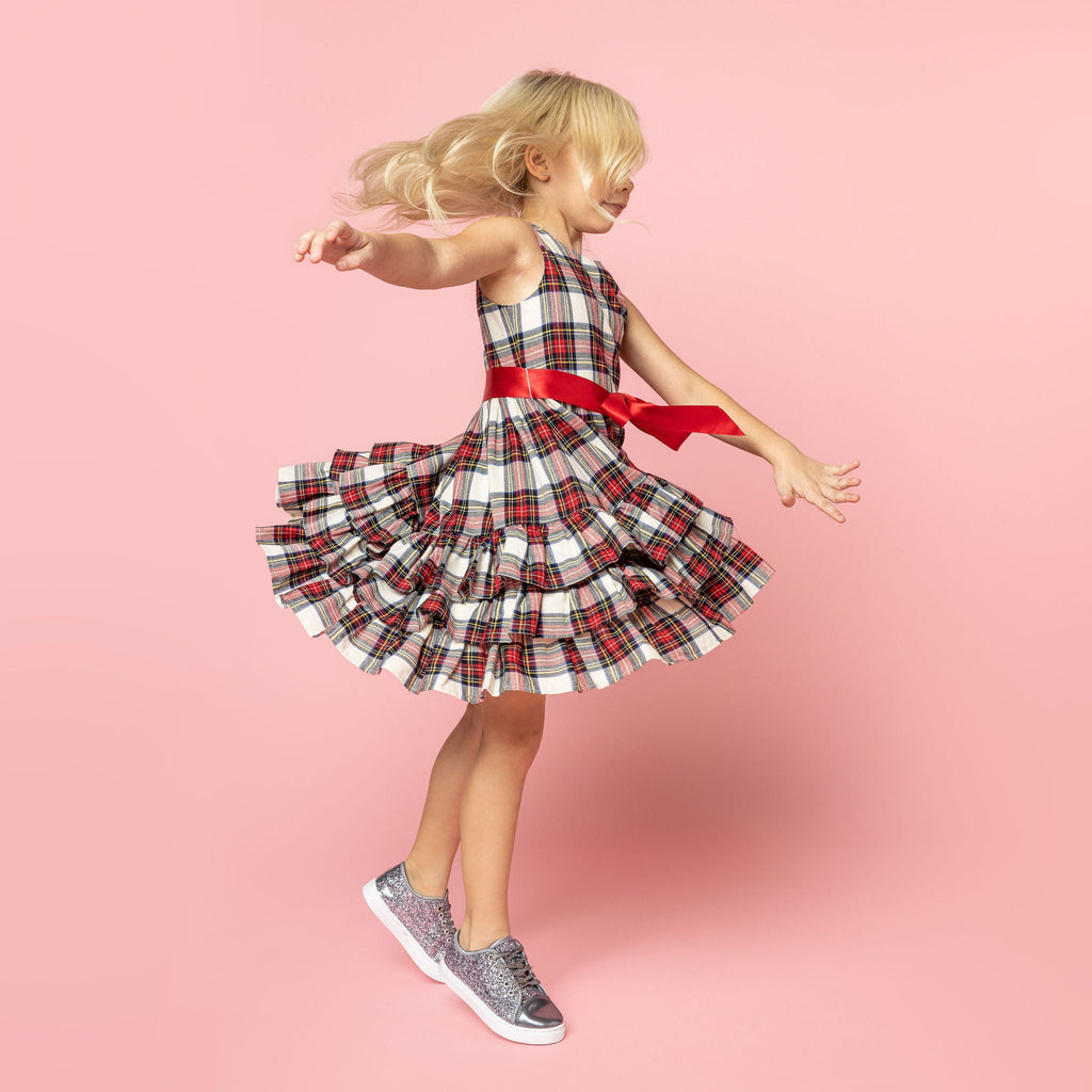 Girl Wearing Arabella Frill Plaid Tartan Girls Party Dress Jumping and Spinning