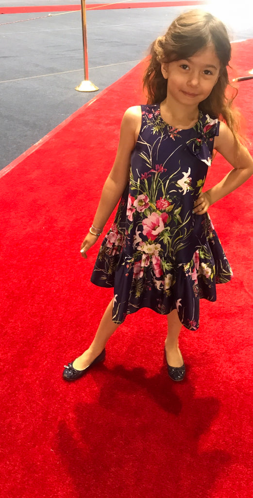 Little girl posing in wearing Davide Charles Royal Blue floral Shift Dress.
