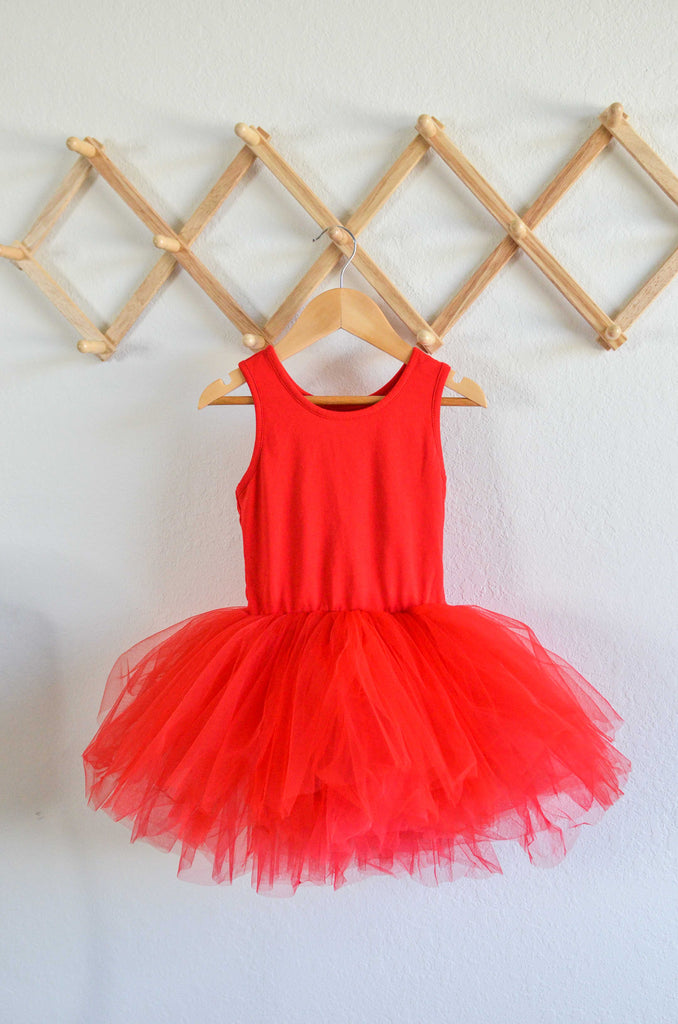 Isolated Red Dress with Tutu on a Coat Hanger