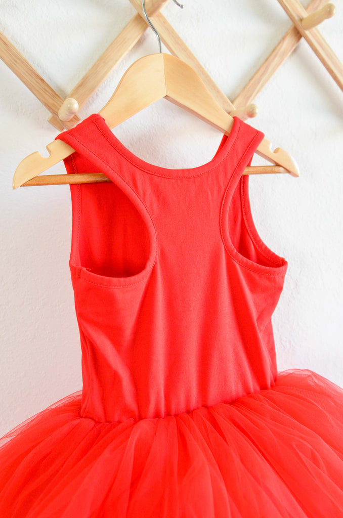 Even Closer View of Red Dress with a Tutu on a Coat Hanger